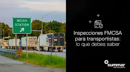 camiones en la via, con letrero de estación de peso más adelante